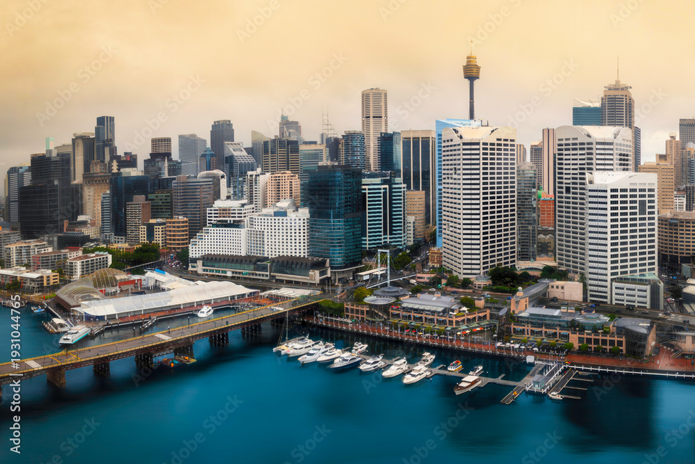 Obraz premium Sydney downtown skyline with modern skyscrapers over Darling Harbour in Australia.