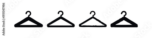 Four simple clothes hanger icons in black and white, representing garment storage and wardrobe organization.