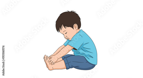 Small child in a blue t-shirt and denim shorts sits on the floor carefully stretching his legs while reaching for his toes.