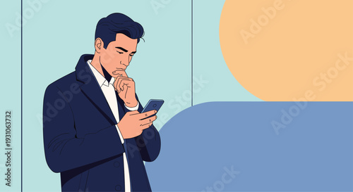 Serious businessman in a dark coat stands pensively while looking at his smartphone and touching his chin in an office setting.