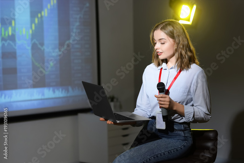 Female business speaker wit...