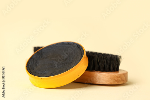 Shoe polish with brush on b...