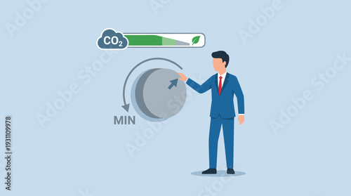 Businessman Turning a Control Knob to Minimum to Reduce Carbon Dioxide Emissions, Concept for Net Zero, Sustainability, and Climate Change Mitigation with CO2 Level Progress Bar Indicator.