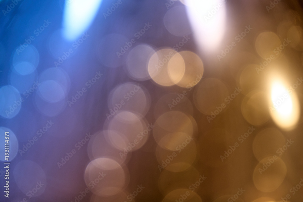 Obraz premium Abstract Blue and Gold Bokeh Light Background