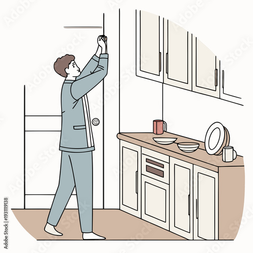 Man tidying kitchen cabinets and household chores