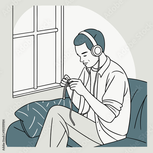Man patiently untangling headphone wires while listening to music