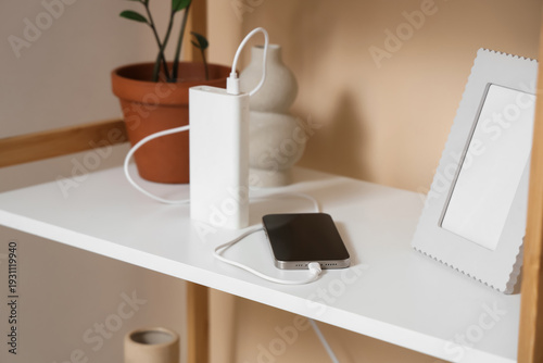 Modern power bank with mobi...
