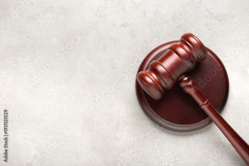 Judge's gavel on light grun...