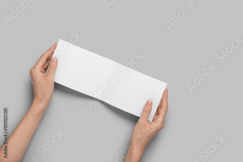 Female hands holding blank ...
