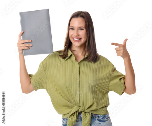 Young woman pointing at not...