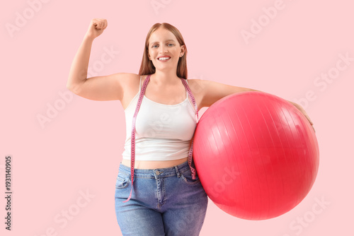 Young happy overweight woma...