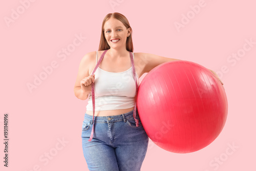 Young happy overweight woma...