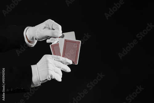 Male magician's hands with ...
