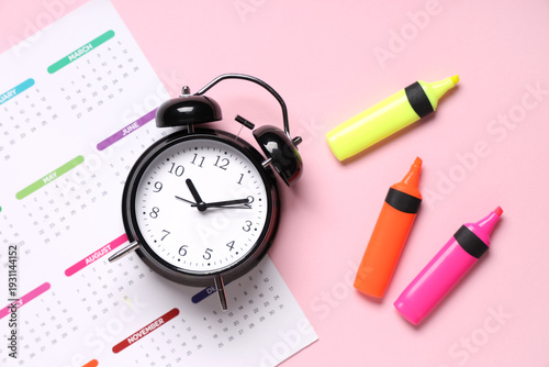 Calendar with alarm clock a...
