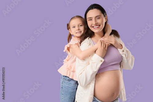 Happy pregnant woman and he...