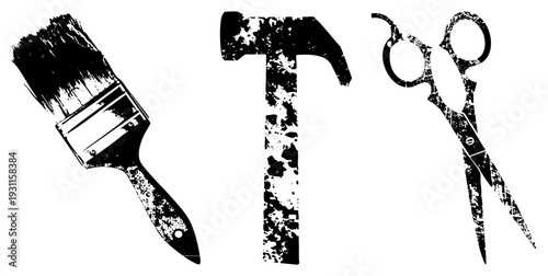 Distressed brush, hammer, and scissors arranged as letter T, stencil art, DIY craft, graphic design elements, gritty typography.