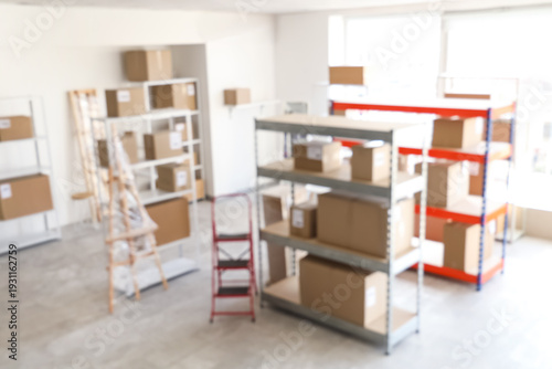 Blurred view of warehouse w...
