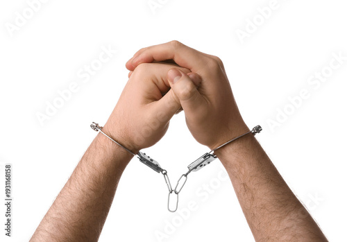 Male hands in handcuffs iso...