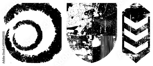 Rusted emblem designs featuring concentric circles, shield with abstract, insignia, distressed textures, vintage style, vector graphics.