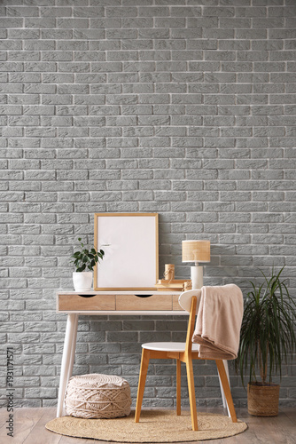 Workplace with blank frame ...