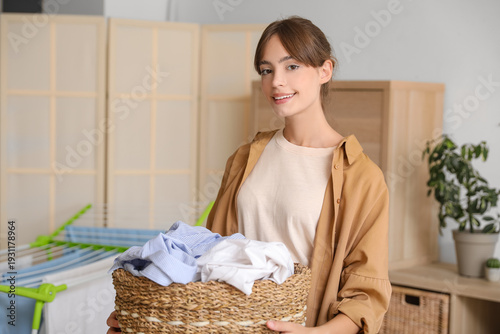 Young woman with basket of ...