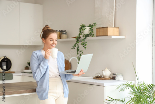 Young woman with cup of cof...