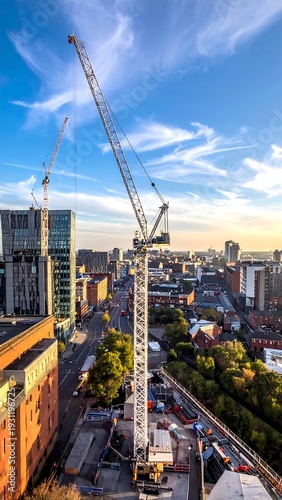 A cityscape with construction cranes