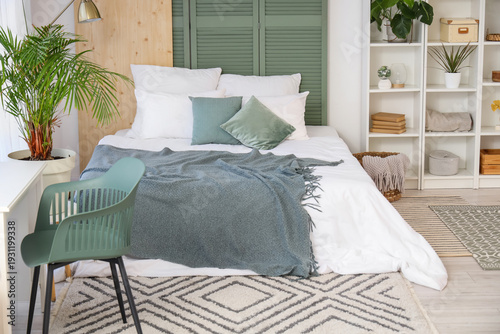 Interior of light bedroom w...