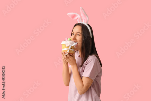 Pretty young woman with bun...