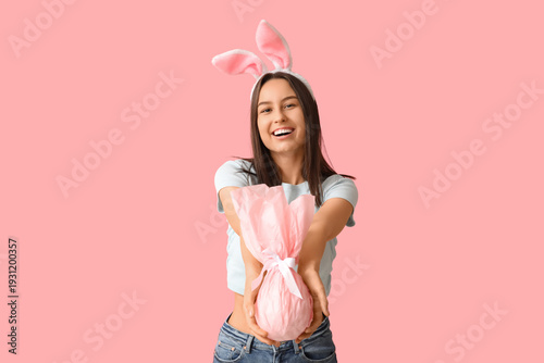Pretty young woman with bun...