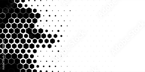 Abstract black hexagon pattern forming a honeycomb structure that gradually dissolves into small dots on a white background.