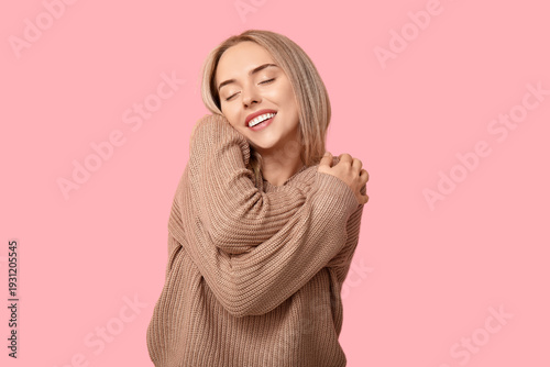 Beautiful young woman embra...