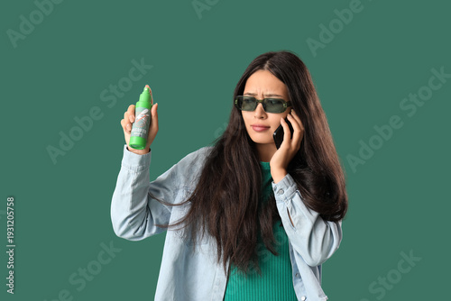 Displeased young Asian with...