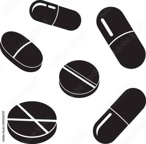 Black pills and tablets on a white background