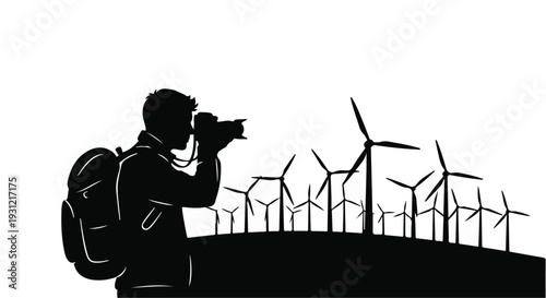 Photographer captures wind turbines in a vast landscape, exploring renewable energy.