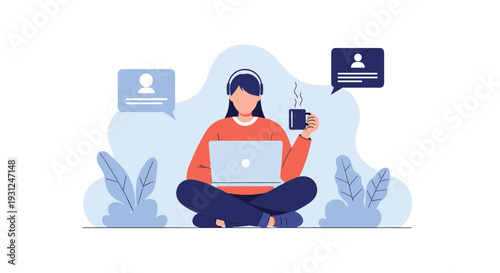 Focused woman sitting cross legged on the floor working on her laptop while enjoying a cup of coffee and listening to music.