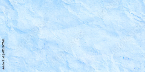Sky blue crumpled paper texture with realistic folds background a modern, edgy backdrop for flyers, social media graphics.
