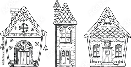Three ornate house facades with pointed roofs and detailed architecture