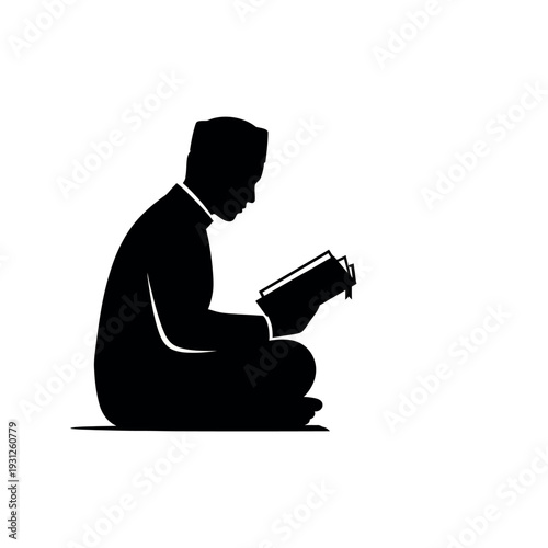 Silhouette of a Muslim man reading the Quran depicting religious devotion and study.
