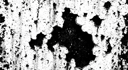 Abstract black blotch on white surface, creating a striking contrast and visual interest.