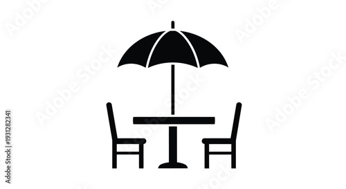 Beach setup with umbrella table and chairs a dark silhouette