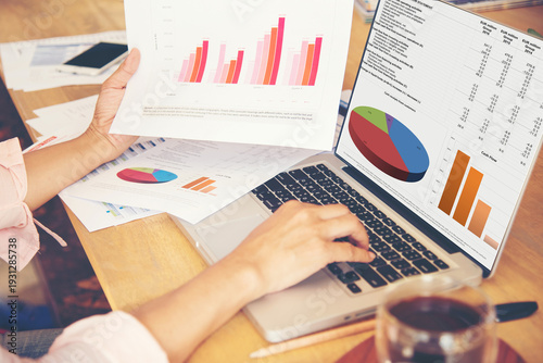 Accountant women hands pointing excel stat financial spreadsheet business graph charts make summary report. Two Business people marketing strategy team report chart, graph, infographic data analyze