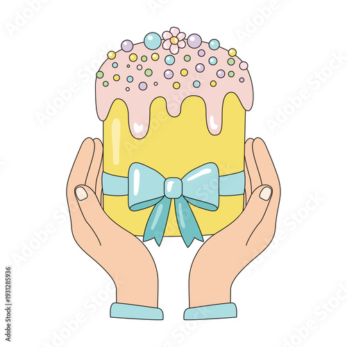 Hands holding traditional sweet Easter cake with icing sprinkles and bow