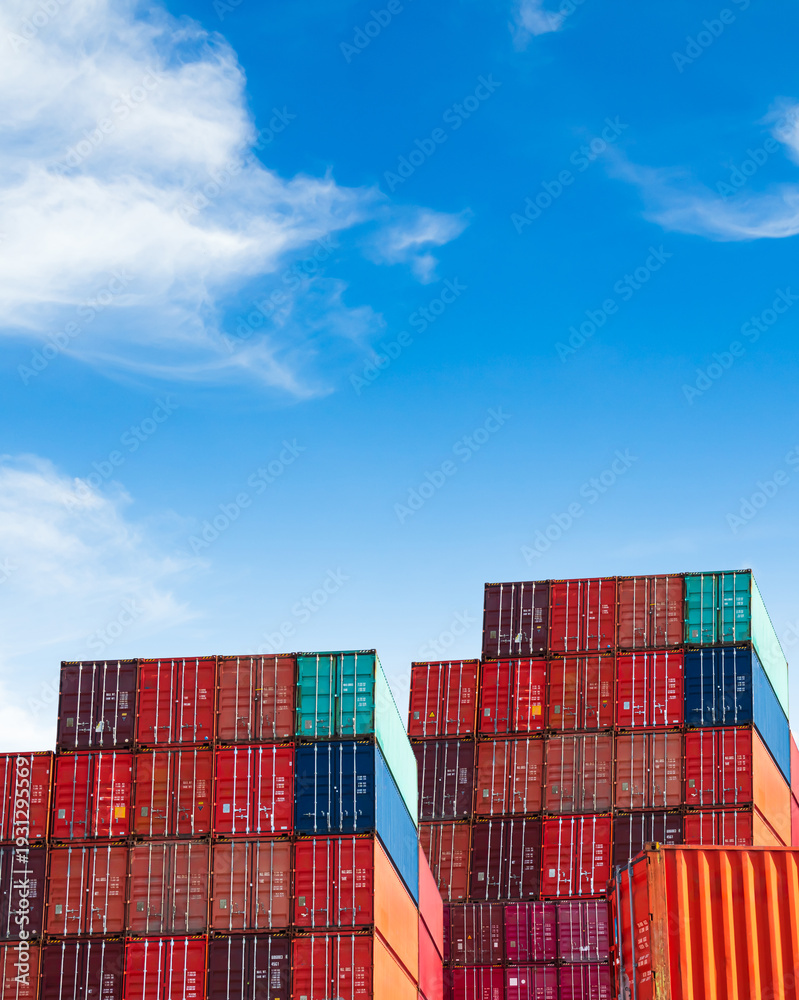 Fototapeta premium Cargo ship container goods export import international transport on blue sky background, warehouse industry business logistics transportation harbor port industrial shipping terminal cargo ship.