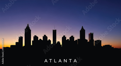 Silhouette of Atlanta city skyline at sunset with vibrant purple and orange hues