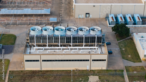 Slika na platnu Industrial data center cooling tower system, power generators on building roofto