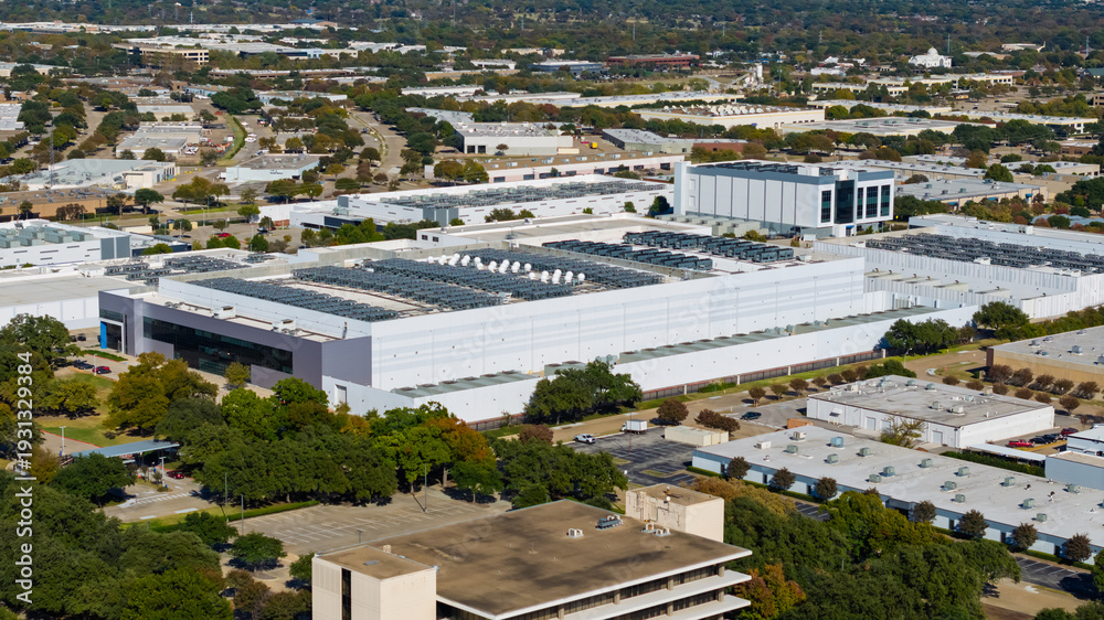 Fototapeta premium Modern industrial park aerial view with rooftops
