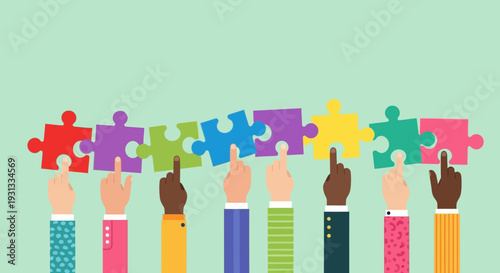 Diverse group of people holding puzzle pieces together in unity.