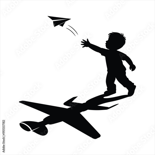 Silhouette of a boy throwing a paper airplane casting shadow of a plane