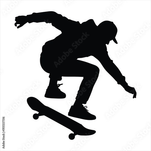 Silhouette of skateboarder performing trick mid-air with skateboard